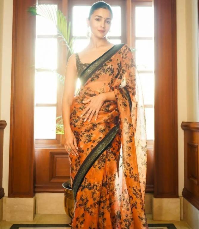 Radhika 267 Organza Silk Designer Fancy Party Wear Saree Collection